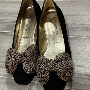 Ron White "All Day Heels" feature a distinct leopard print bow detail.